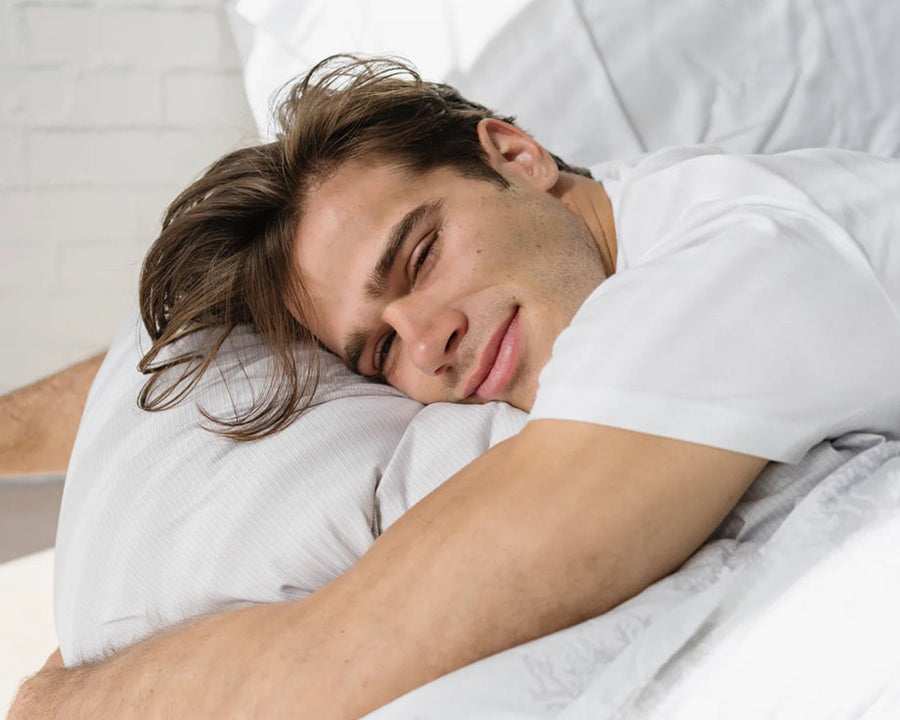 portrait of man in bed