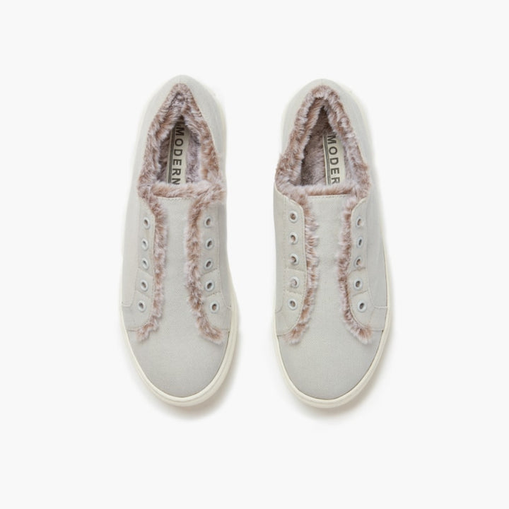 Aerial view of grey faux fur lined slippers set against a white backdrop #color_grey