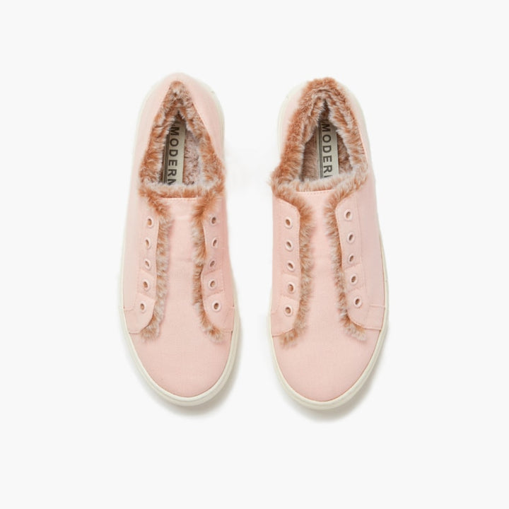 Aerial view of pink faux fur lined slippers set against a white backdrop #color_pink