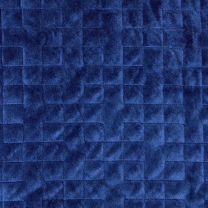 Closeup of stitching on plush navy fabric - #color_navy