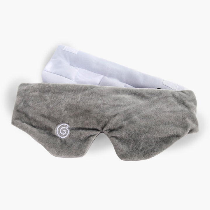 Plush grey weighted sleep mask against a white backdrop