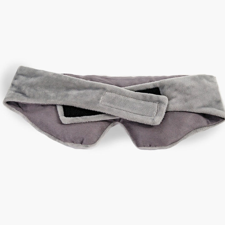 Velcro closure on a plush grey weighted eye mask