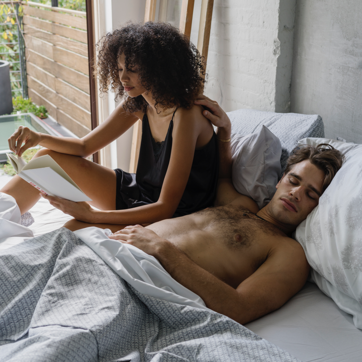 Couple in bed with micro sheets