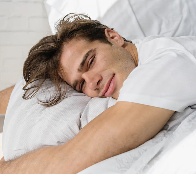 portrait of man in bed