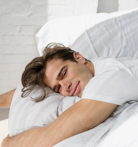 Man resting in bed